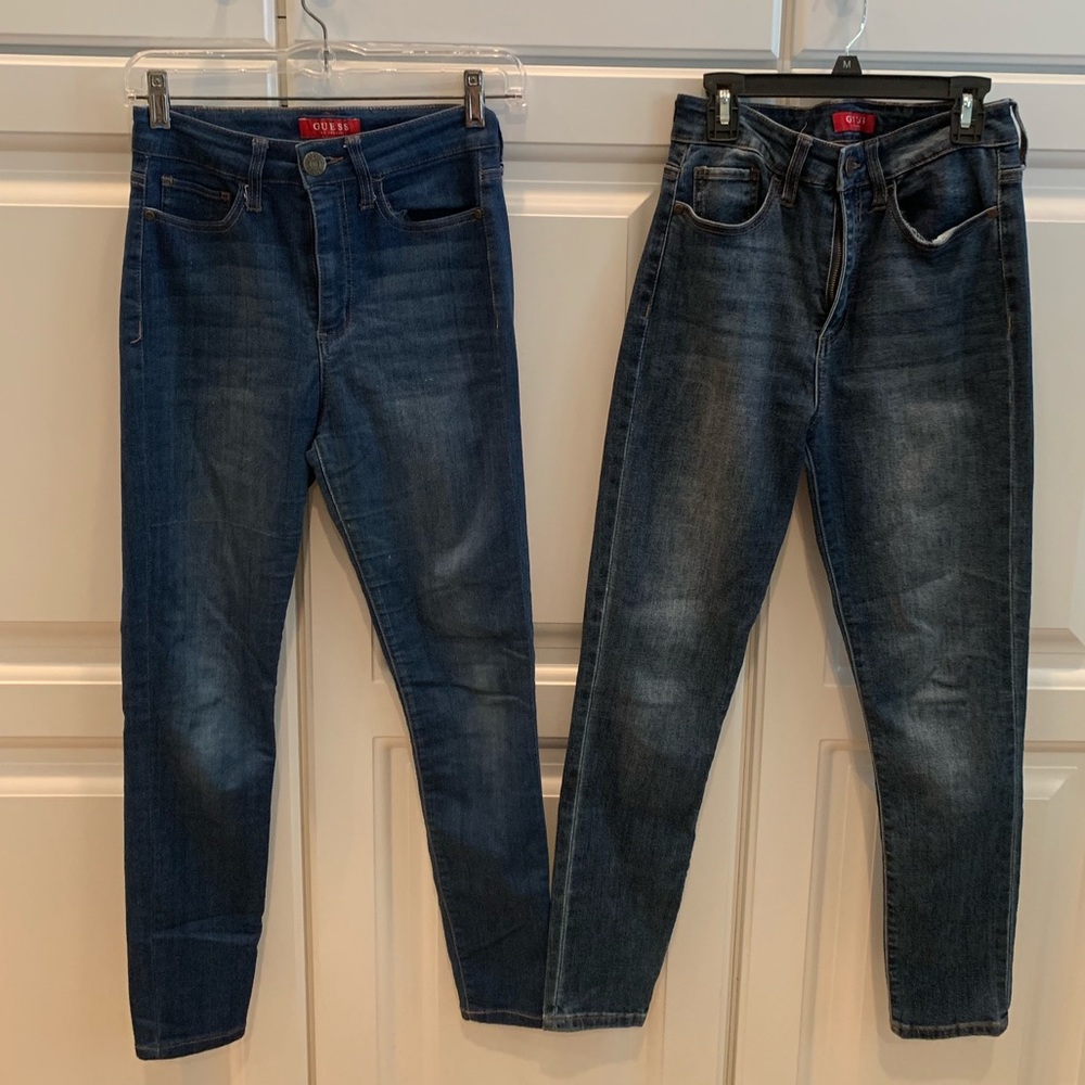 TWO PAIRS OF GUESS JEANS